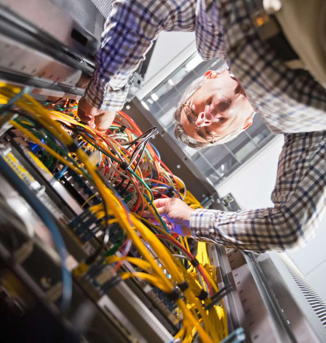 low-angle-vertical-shot-of-a-technician-checking-w-2026-01-11-09-53-17-utc